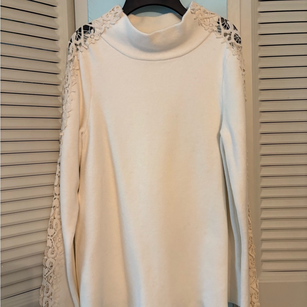 Never worn cream lace down bell sleeves. Beautiful knit sweater. Size small.